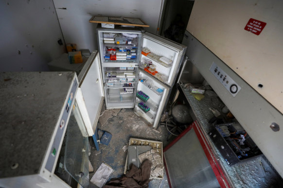 Tubes of specimens lie inside a broken fridge inside Al Basma IVF Centre, Gaza’s largest fertility clinic.