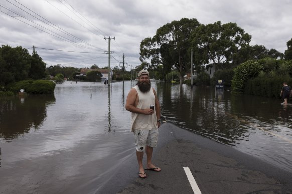 Steve Nicholson’s home remains inundated with floodwaters.