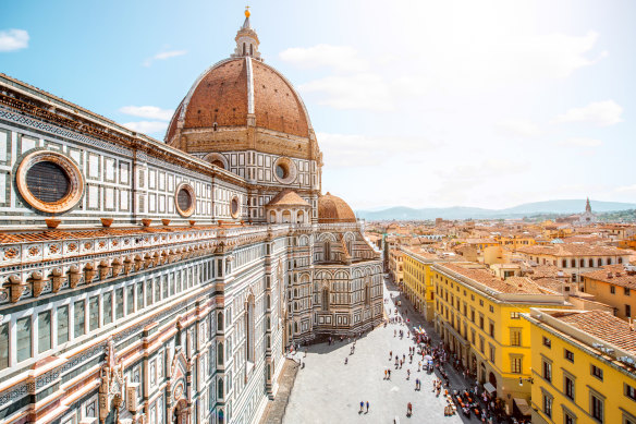 The dome of Santa Maria del Fiore church and old town in Florence.