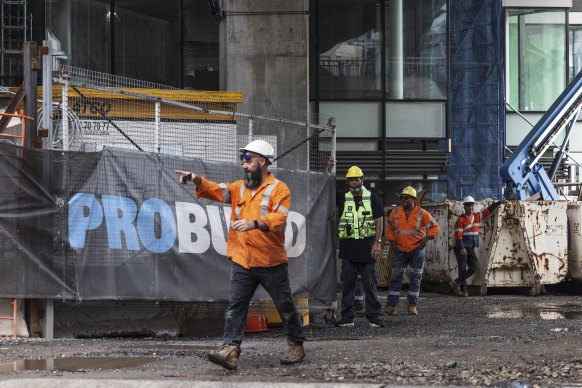 Workers at Pro Build’s Ribbon Project site at Darling Harbour Thursday.