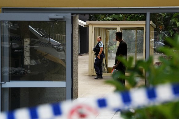 Police at the unit block  in Penrith where the woman’s body was found.