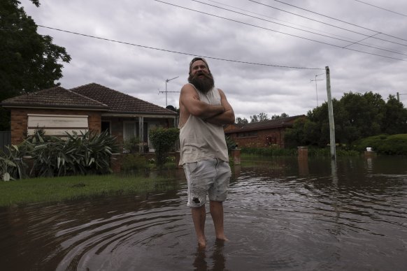 Steve Nicholson’s home remains inundated with floodwaters.