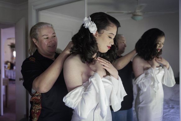 Kazvaana Piho, a year 12 student at St Clare’s, gets ready with mum Deb at home.