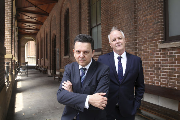 Former independent senator Nick Xenophon and his law partner, former ABC foreign correspondent Mark Davis, outside the Supreme Court in Sydney.