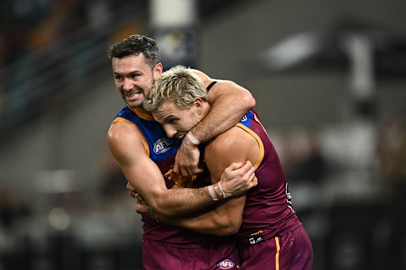 Conor McKenna of the Lions congratulates Kai Lohmann of the Lions.