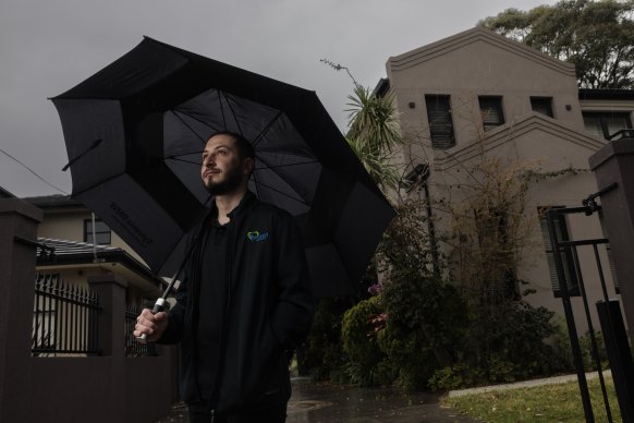 First home hopeful Lewis Alha, pictured outside his parent’s home, knows rising interest rates will make it hard to take advantage of lower property prices. 