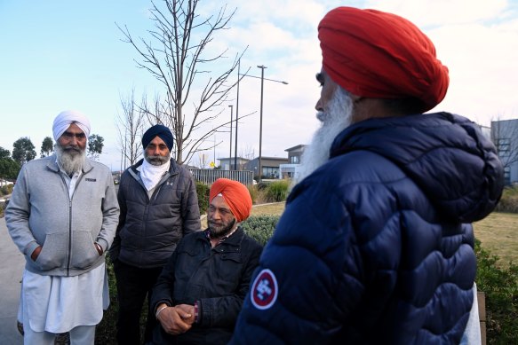 Karamjit Singh (3rd from left), lives with his son and daughter-in-law in Marsden Park. He contributed to his sons deposit and says his family are feeling the impact of rising mortgage repayments and cost of living.