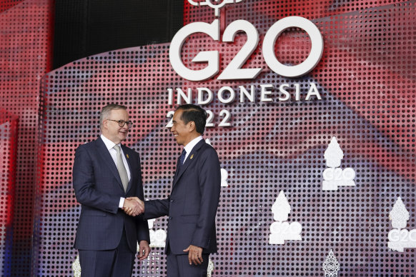 Prime Minister Anthony Albanese greets Indonesian President Joko Widodo as he arrives for the G20 leaders’ summit in Bali.