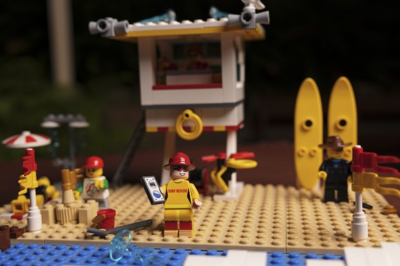 A mini shark drone operator as part of the beach-themed Lego set designed by Mr Macrae.