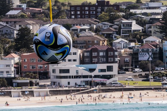 The ball floats over Bondi Beach.