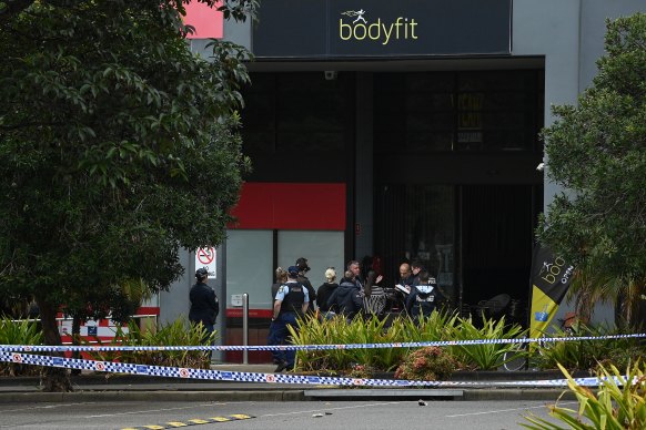 Police at the Bodyfit gym at Auburn on Wednesday.