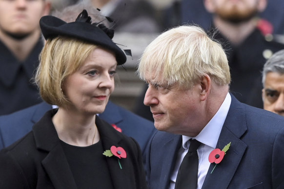 Former British prime ministers Liz Truss and Boris Johnson attending the Remembrance Sunday ceremony in November 2022.