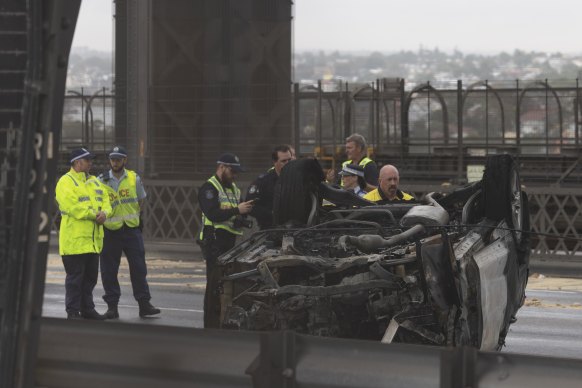 One of the cars involved in the accident is examined.