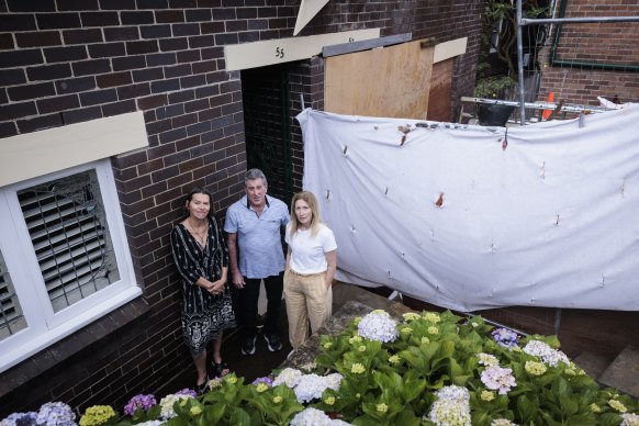 Hayley White, Lee Wright and Lisa Haynes have raised concerns about a building site adjacent to their homes.