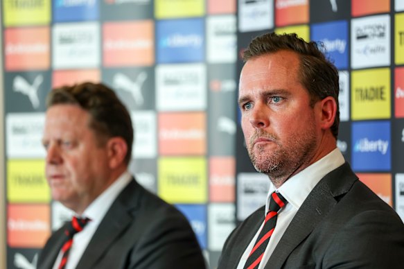 Essendon president Andrew Welsh (right) and CEO Tim Roberts (left) address the media after the club parted with Brad Scott.