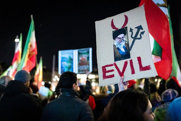 People protest in Zurich, Switzerland in support of Iranian protesters on Tuesday.