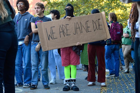 A demonstrator at a protest against Cornell University’s handling of the 2024 fraternity-house gang rape allegations at the campus.