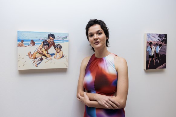 Thea Perkins with two of the prize-winning works.