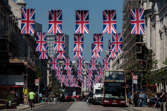 Bunting for the coronation of King Charles III adorns Regent Street in central London.