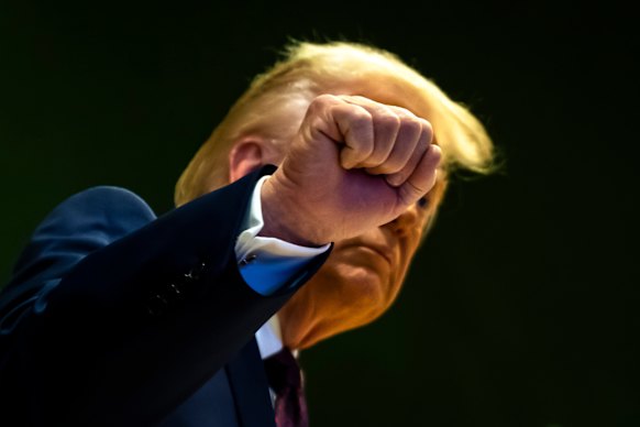 US President Donald Trump gestures at the World Economic Forum in Davos, Switzerland, on Thursday.