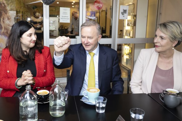 Labor candidate for Chisholm Carina Garland, Opposition Leader Anthony Albanese and Shadow Minister for Education Tanya Plibersek during a visit to a cafe in Mount Waverley.