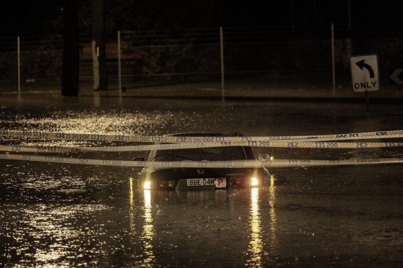 A car submerged in floodwaters in Chipping Norton on Monday. 