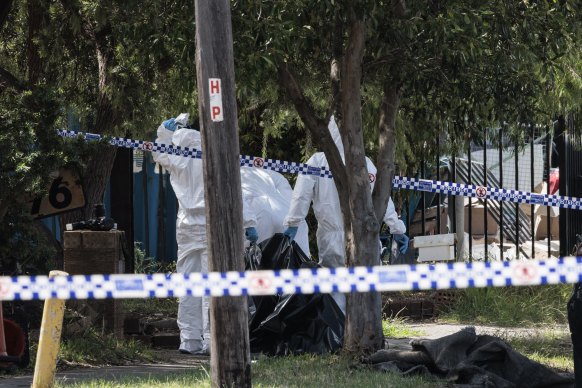 Forensic teams at the scene of a shooting in Sefton on Thursday.