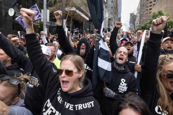 Protesters shout their support during the rally.