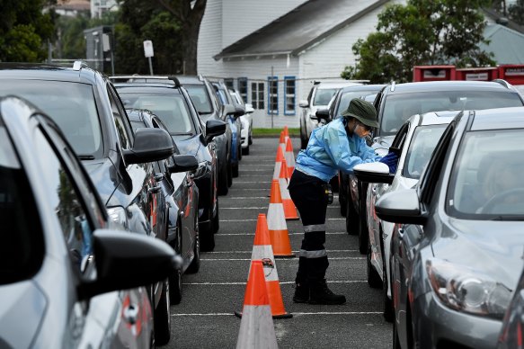 Long COVID-19 testing queues in Sydney’s Rose Bay on Thursday. 