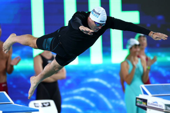 Karl Stefanovic dives in for his leg of the celebrity relay.