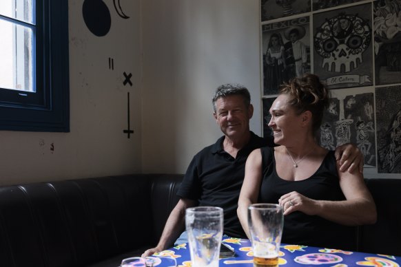 Colleagues Craig Lowe and Danielle Coco enjoy a drink after work at the Slip Inn, these days known as the El Loco Slip Inn. 