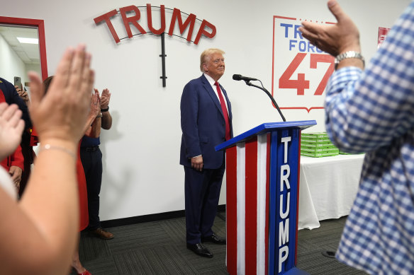 Republican presidential nominee former president Donald Trump speaks during a stop at a campaign office in Roseville, Michigan, on Monday.