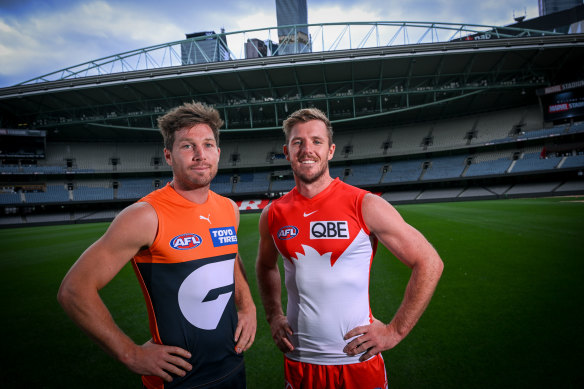 Giants skipper Toby Greene and Sydney co-captain Luke Parker earlier this year.