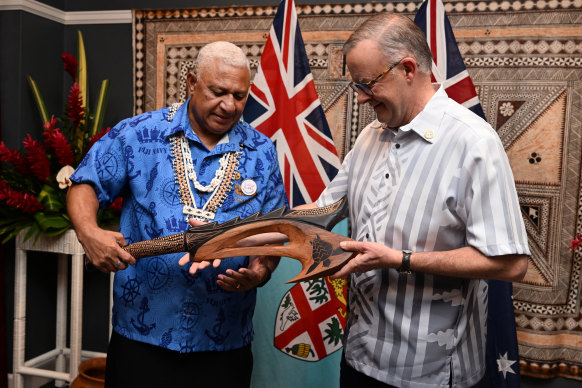 Fiji’s Prime Minister Frank Bainimarama greets Australia’s Anthony Albanese during a bilateral meeting at the Pacific Islands Forum on Wednesday. 