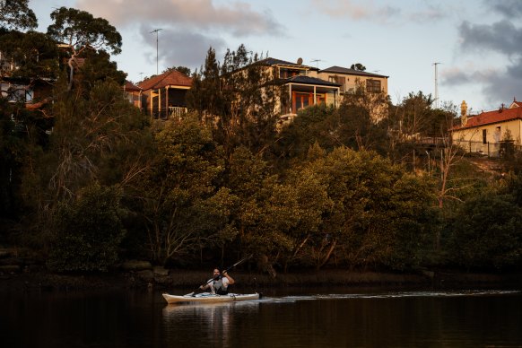 Kayaking the Cooks River, whose rehabilitation continues.