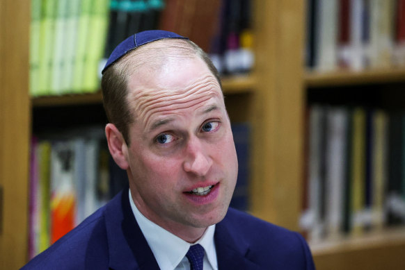 Prince William, Prince of Wales wears a kippah on a visit to the Western Marble Arch Synagogue in London on Thursday.