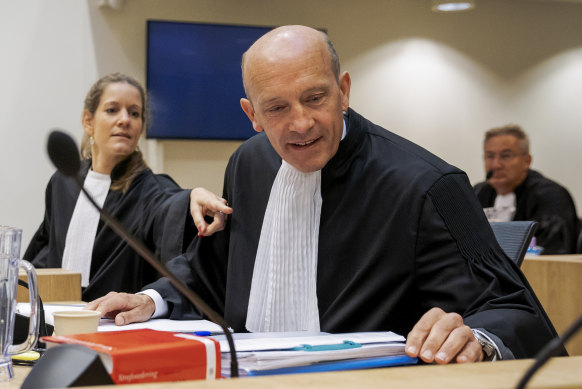 Sabine ten Doesschate, left, and Boudewijn van Eijck, the lawyers for one of the four suspects, Russian Oleg Pulatov.