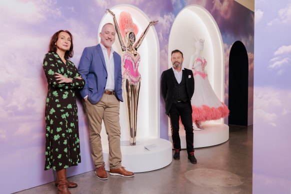 Eva Czernis-Ryl, Mark Sutcliffe and Ronan Sulich part of the curatorial team led by Leo Schofield at the Powerhouse Museum’s  1001 Remarkable objects exhibition, with the Kylie Minogue showgirl outfit.
