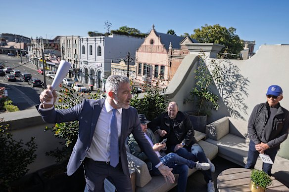 The property on an iconic inner west strip shattered a record at auction on Saturday.