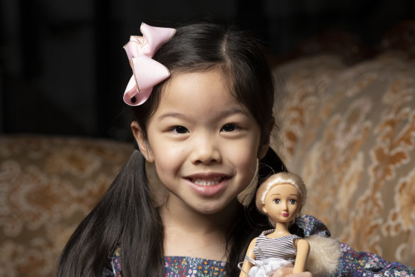 Riley Huynh of Moorebank with her Barbie doll at a high tea at the Casula Powerhouse earlier this month.