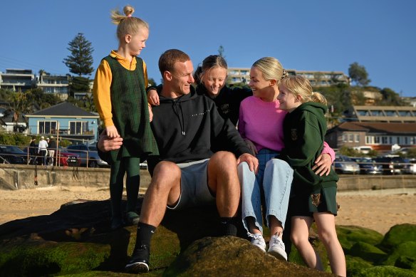 Daly Cherry-Evans with wife Vessa and three girls, Navi, 10, Harvie, 8 and five-year-old Tully at South Curl Curl Beach.