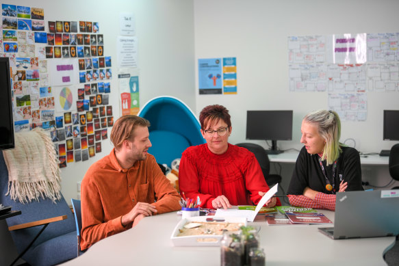 Hester Hornbrook Academy principal Sally Lasslett (centre) with teacher Eric Woodward and youth worker Felicity Gibbons.