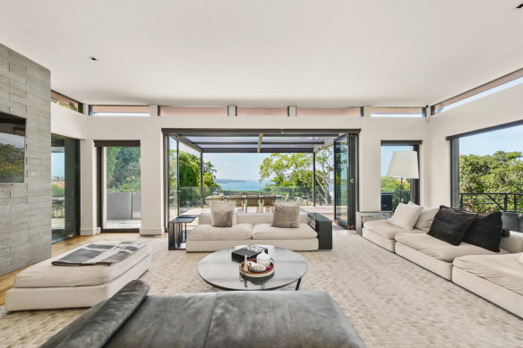 The five-bedroom Point Piper house comes with one of the few tennis courts in the suburb.