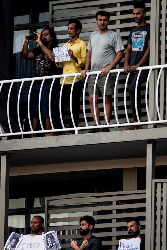 Asylum seekers protest on the balconies of a detention centre in Brisbane. 