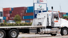 Containers were piling up at DP World’s terminal in Sydney’s Port Botany on Sunday because trucks could not get ino the terminal to collect them.