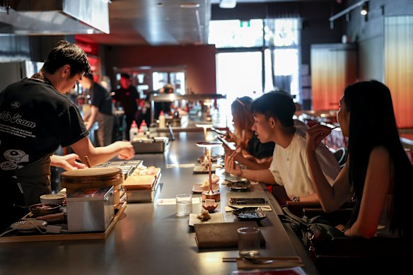 The bar is the most interesting place to sit.