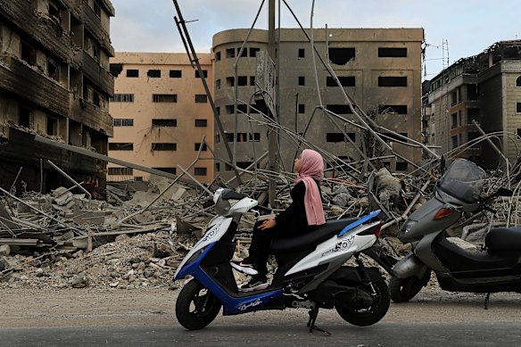 Manessa Ali, 10, surveys the damage in Dahiyeh, Beirut, in the aftermath of an Israeli strike on a medical facility last year.