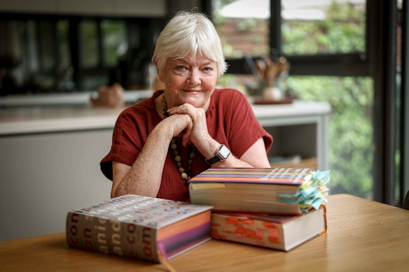 Triple threat: Stephanie Alexander with all three editions of her mighty Cook's Companion.
