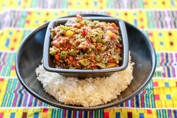 Fried okra stew with fish and rice.