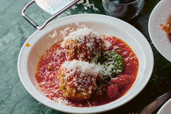 A dollop of basil pesto adds piquancy to this classic meatball dish.